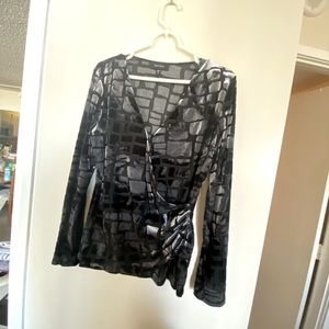 Beautiful snake design w a 3d finish stretch classic v neck wrap top Karen Kane.